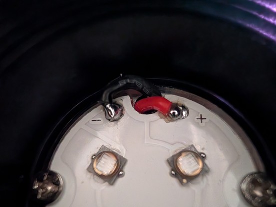 Wires of the new driver soldered to the LED board.