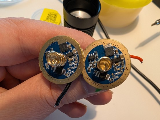 Front of the broken and new driver. A capacity isn't straight on the pads.